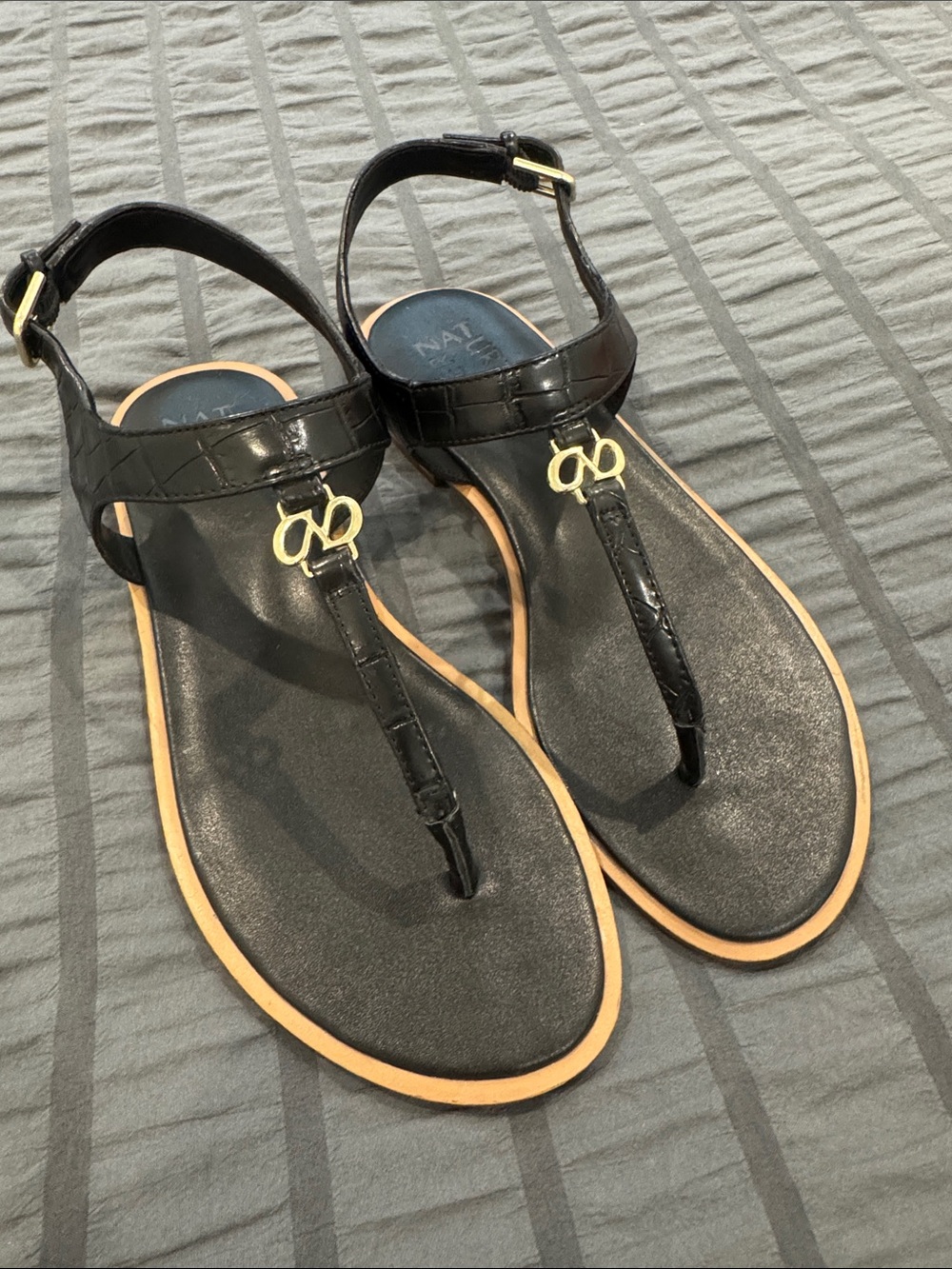 Naturalizer Black Thong Sandals with Gold Logo Accent